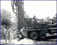 Two men drilling